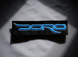 Doro Logo Embroidered Patch – Blue Rock Band Iron-On Badge for Jackets & Vests