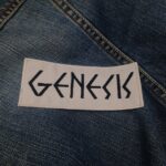 Genesis Patch – White Background with Angular Black Text – Iron-On