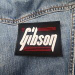 Gibson Vertical Script Logo Patch with Red Lines – Iron-On